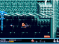 A Ghostbuster firing a proton stream at a blue ghost in Ghostbusters: Special Edition for Sega Genesis