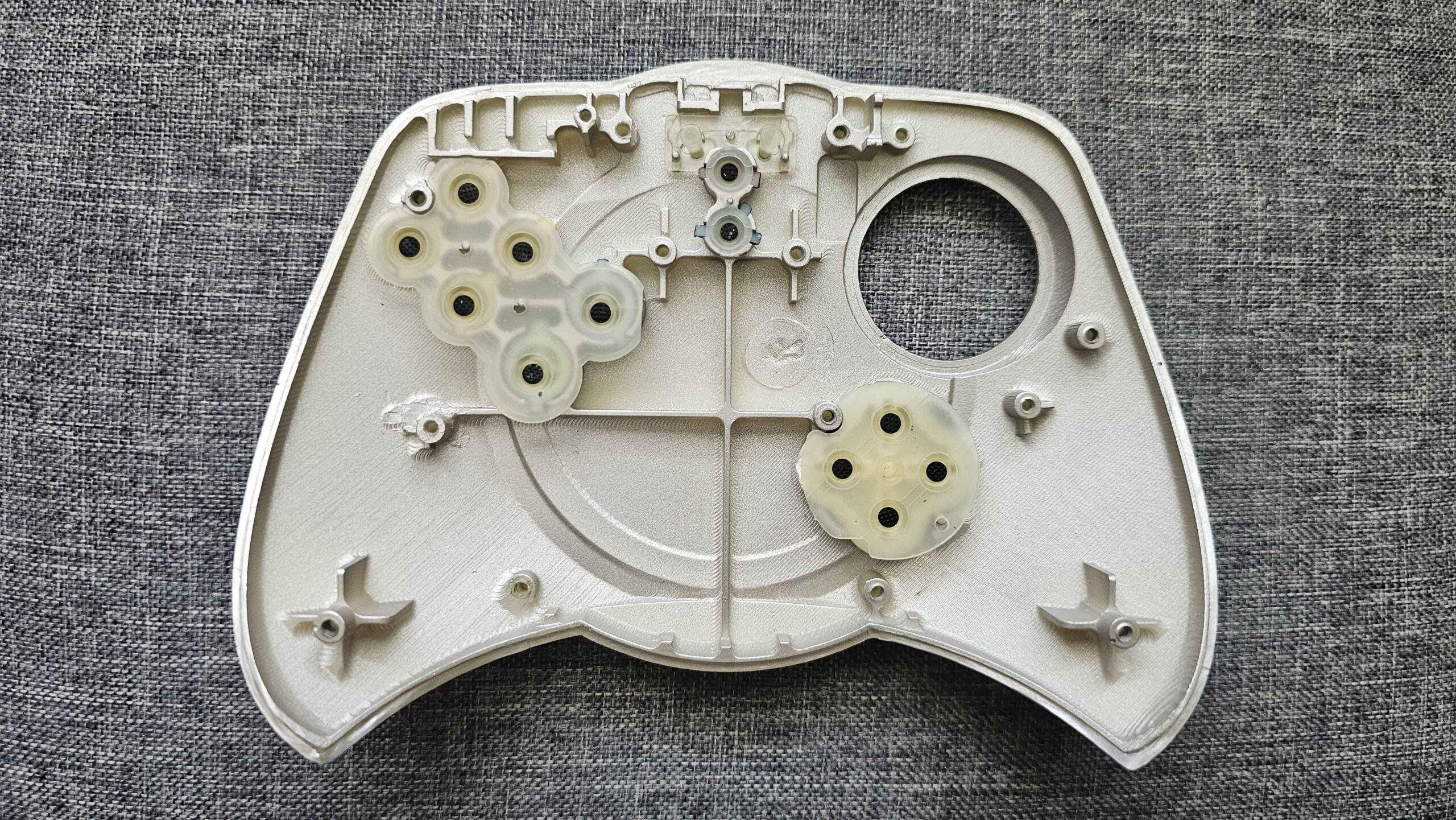 A preproduction iQue Player prototype console with a Beta 5399 label, one of four units dumped by the iQueBrew team