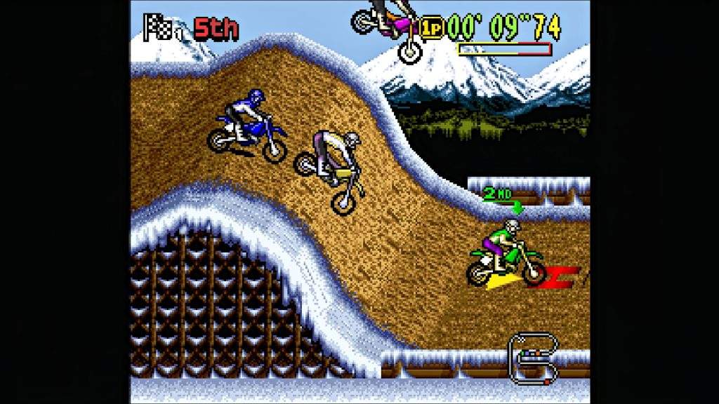 Three dirt-bike riders battle on a snowy hillside track in Moto X
