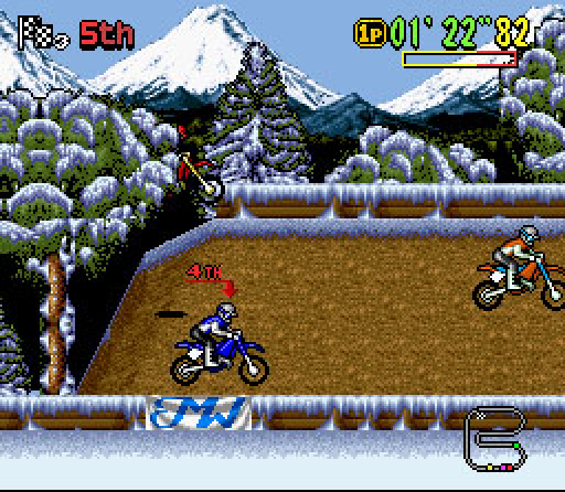 Moto X gameplay: motocross riders racing down a snowy hill on Super Nintendo